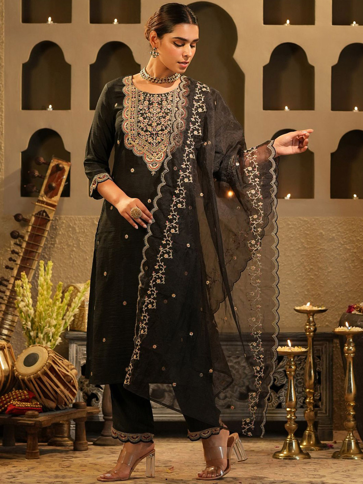 Elegant floral embroidered kurta set in black with intricate detailing and matching dupatta for festive occasions
