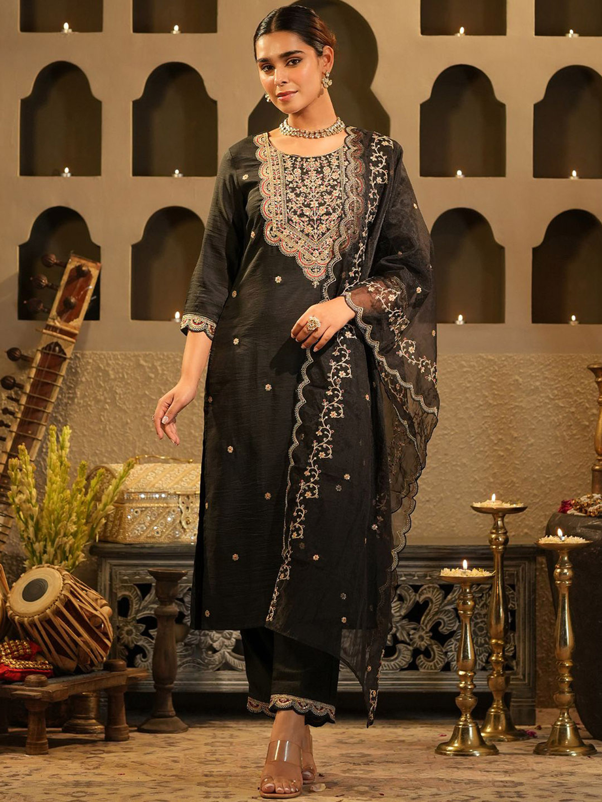 Elegant floral embroidered kurta set in black with intricate designs and matching dupatta for festive occasions