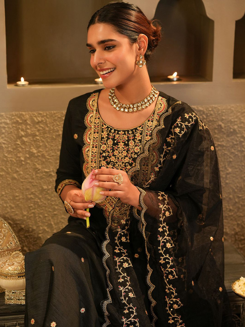 Elegant floral embroidered kurta set in black with intricate designs and a stylish dupatta