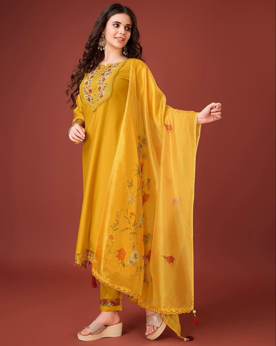Aromie floral embroidered kurta set in yellow with intricate designs and matching dupatta for festive occasions