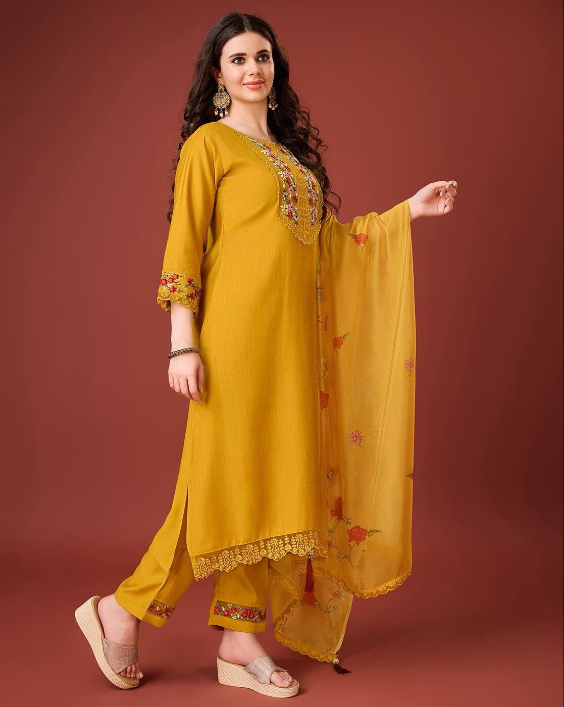 Floral embroidered kurta set in yellow featuring elegant embroidery and matching dupatta for a festive look