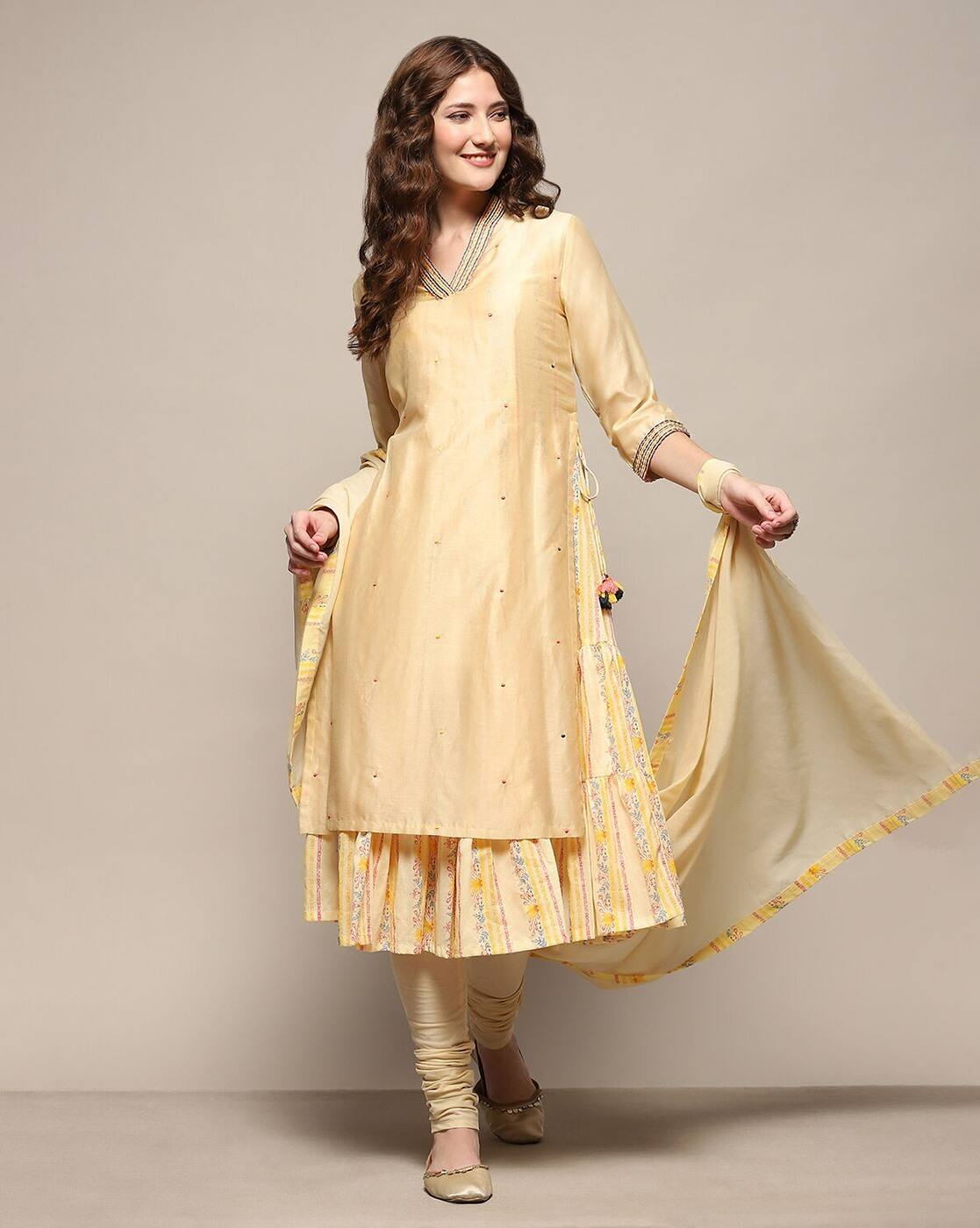 Aromie three piece floral embroidered silk kurta set in soft yellow with matching dupatta and churidar