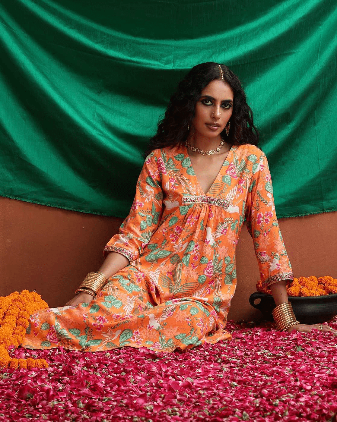 Floral Kurta Set for Women in vibrant orange with intricate floral patterns, perfect for festive occasions