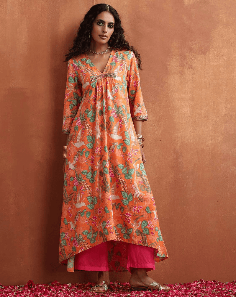 Aromie Floral Kurta Set for Women in Orange with Colorful Floral Patterns and a High-Low Hem