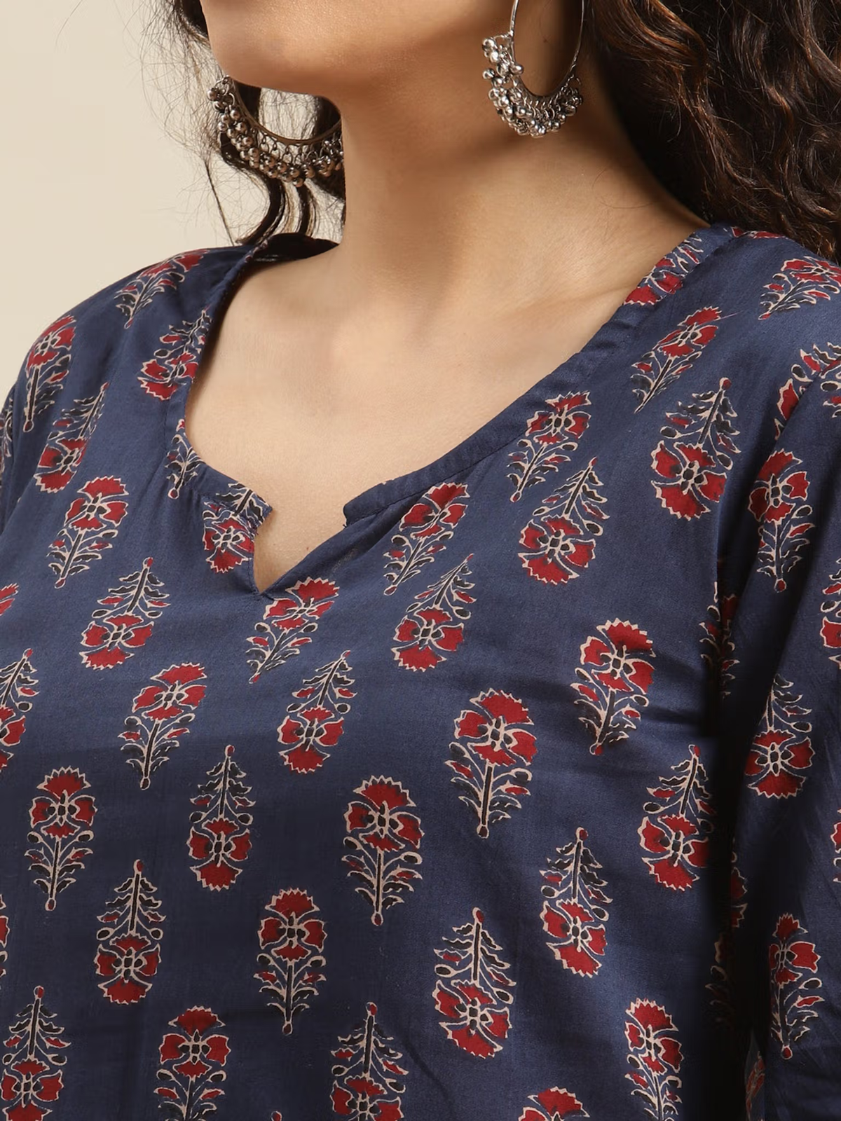 Aromie single piece kurta featuring a floral navy jumpsuit women pattern with red and white flowers