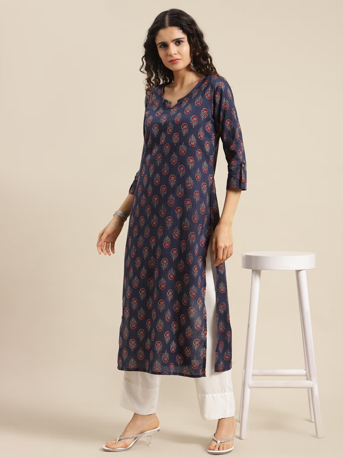 Aromie single piece kurta with floral navy jumpsuit women print and three-quarter sleeves styled with white pants