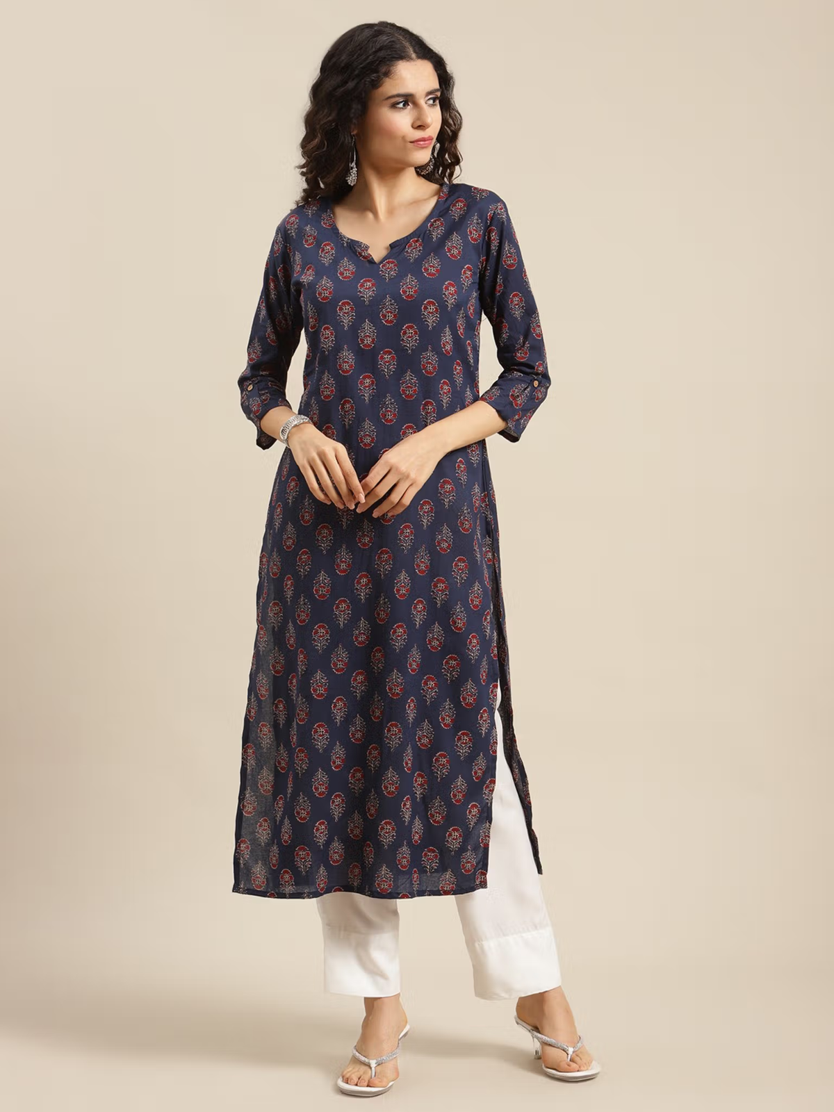 Aromie single piece kurta featuring floral navy jumpsuit women design with three-quarter sleeves and side slits