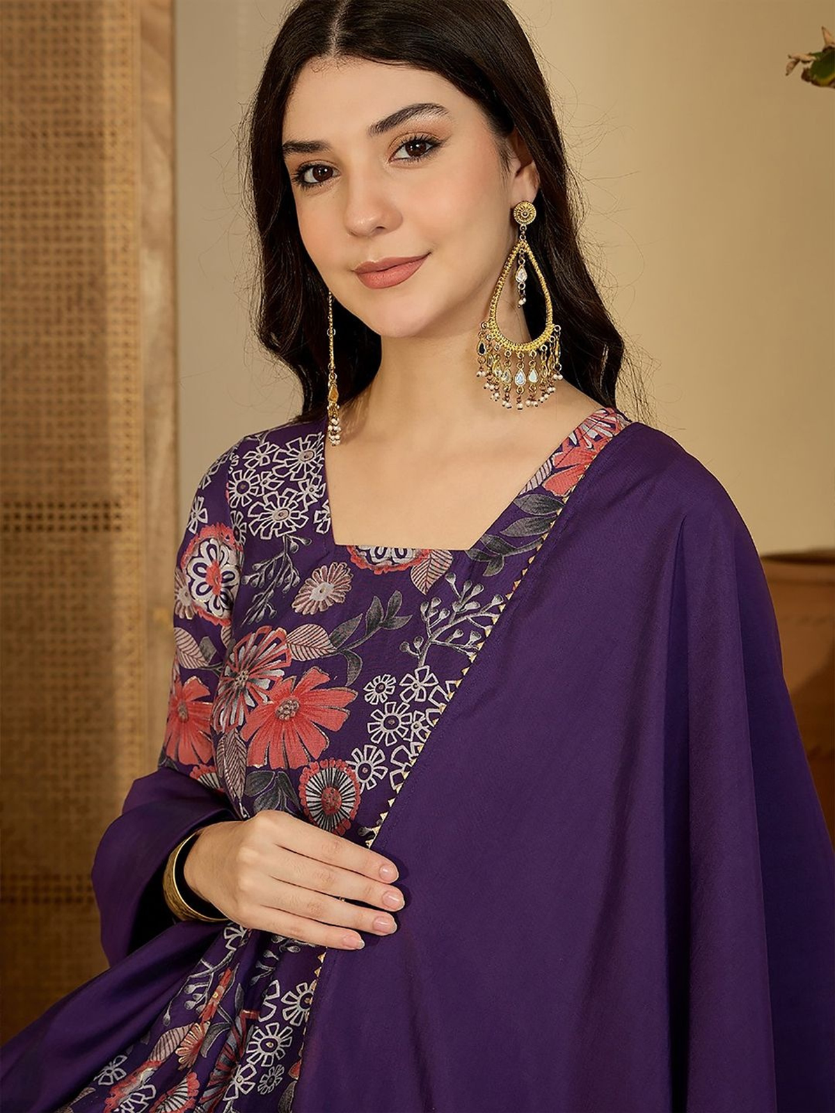 Aromie floral printed bell sleeves kurta in vibrant colors with elegant embellishments