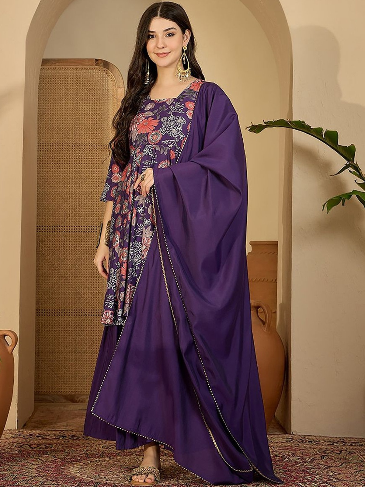 Elegant floral printed bell sleeves kurta set with a stylish purple cape drape for a chic look