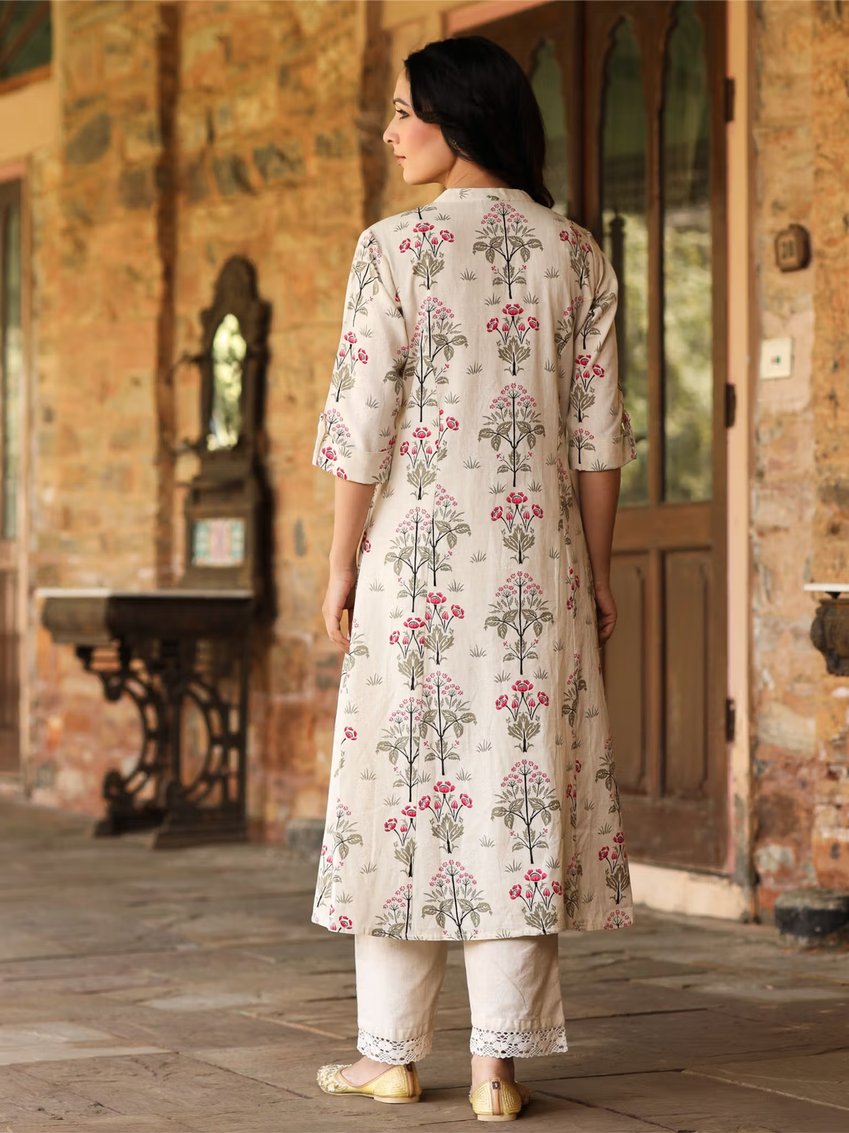 Aromie single piece kurta featuring a floral printed jumpsuit for women with three-quarter sleeves and a straight fit