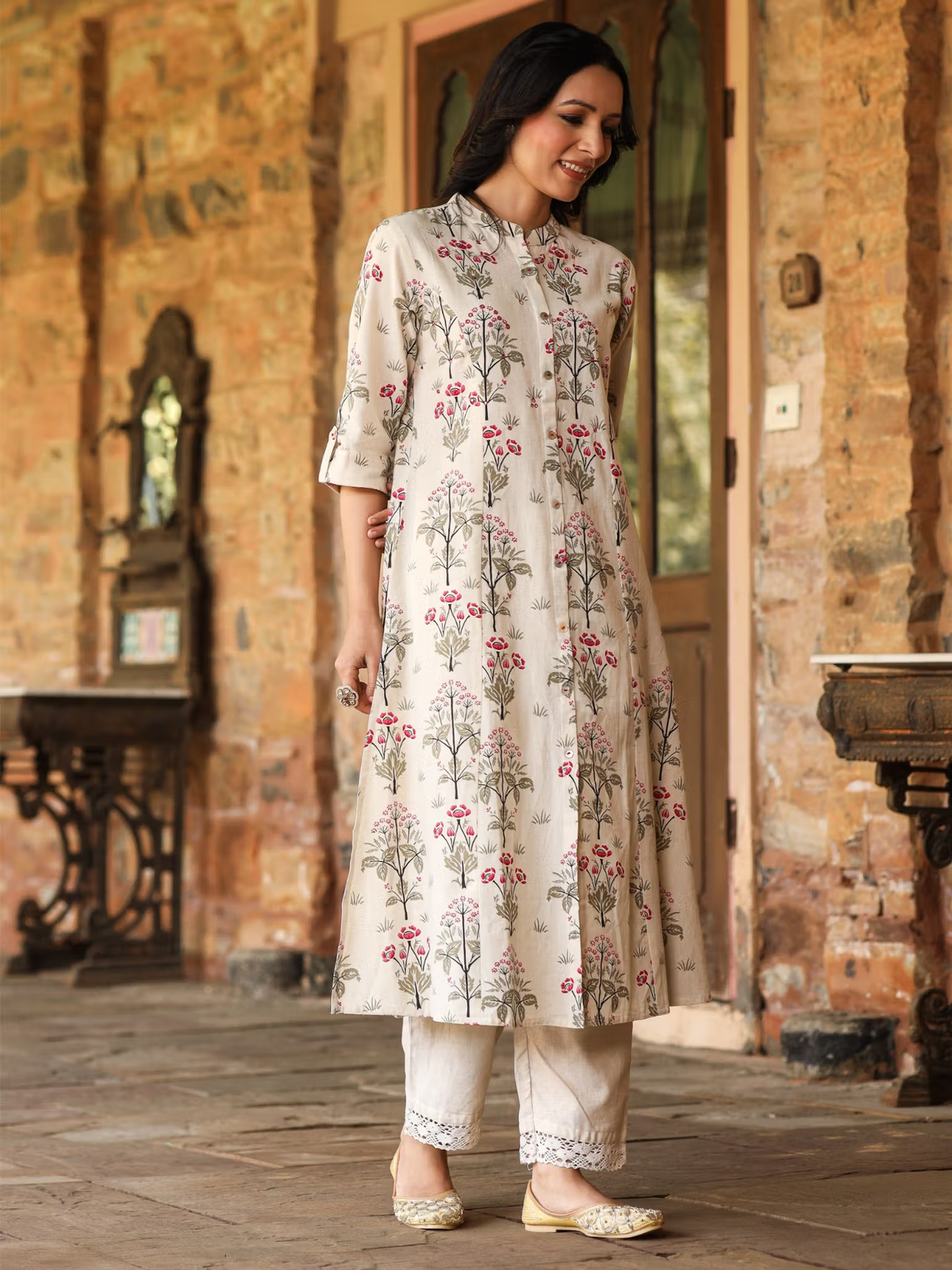 Aromie single piece kurta with floral printed jumpsuit for women featuring a beige base and pink flower designs