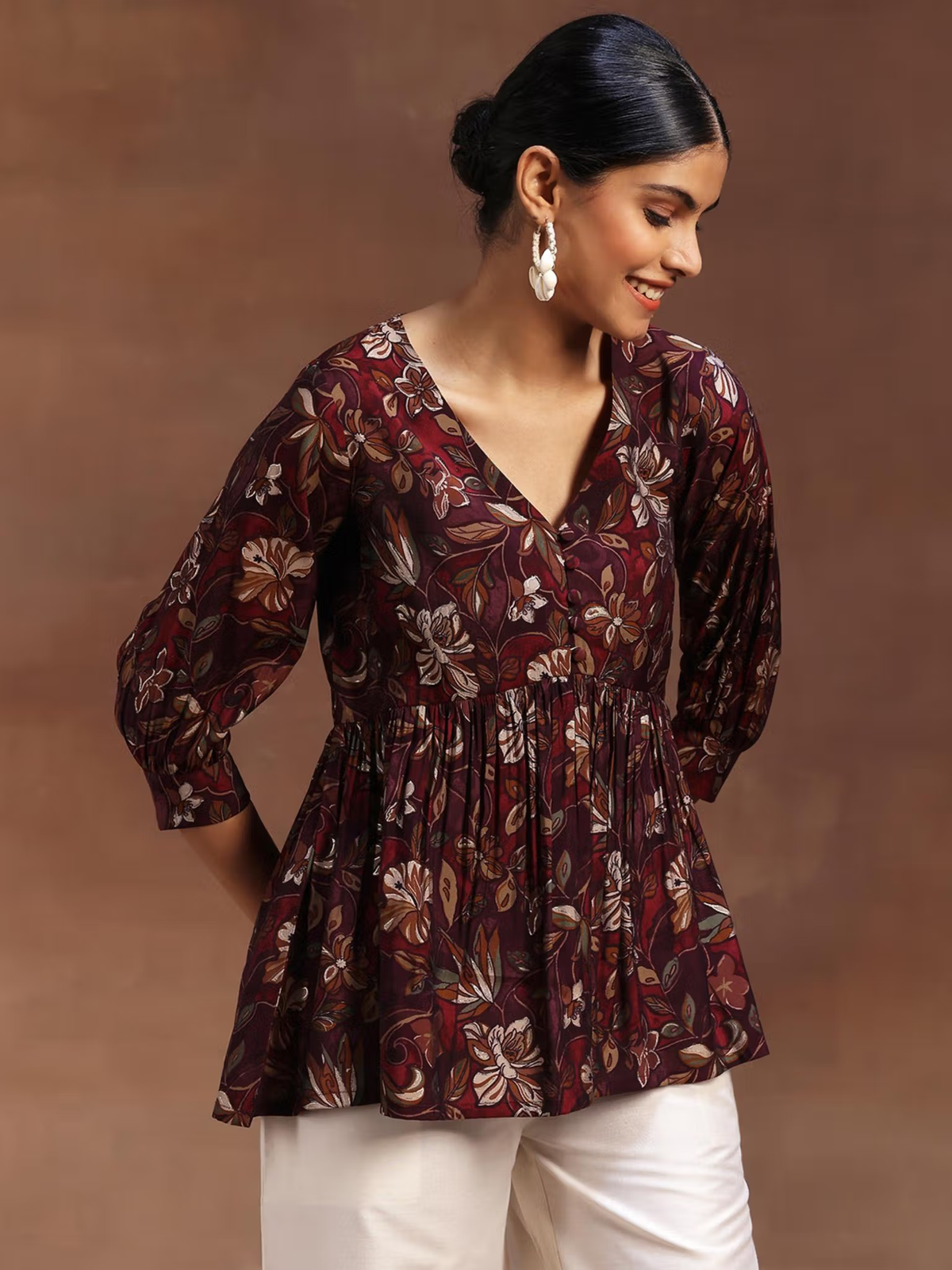 Aromie single piece kurta with floral rayon jumpsuit print in maroon with long sleeves and V-neck
