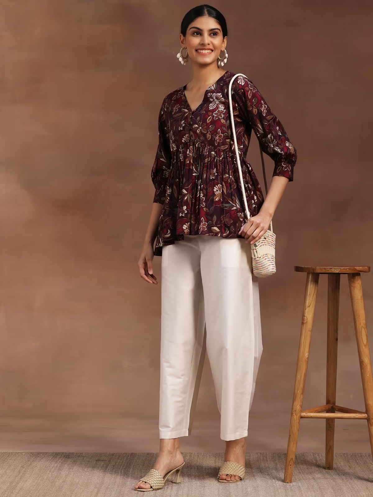 Aromie single piece kurta with floral rayon jumpsuit print in dark brown and white pants