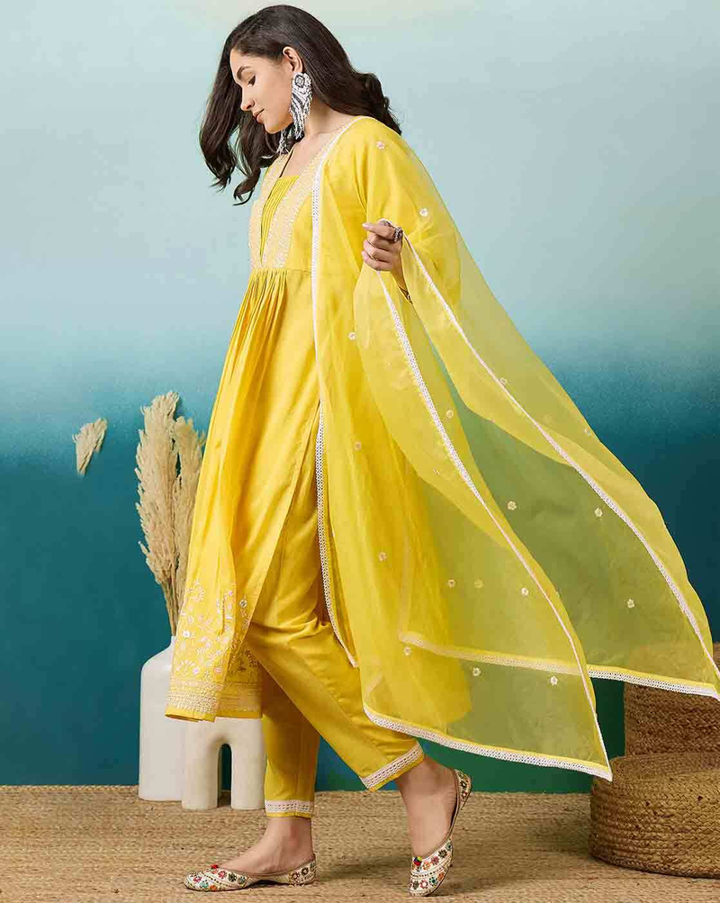 Aromie three piece Kurtha in bright yellow with sheer dupatta and detailed embroidery floral tiered dress for women