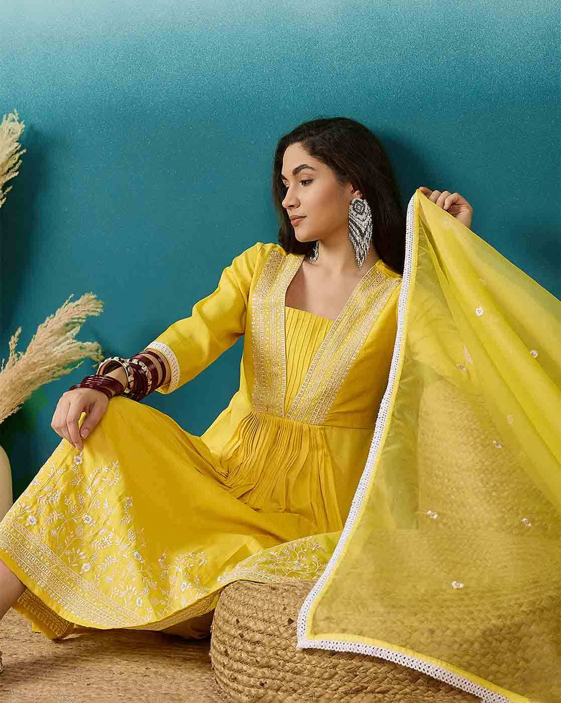 Aromie three piece Kurtha in yellow styled as a Floral Tiered Dress for Women with intricate embroidery