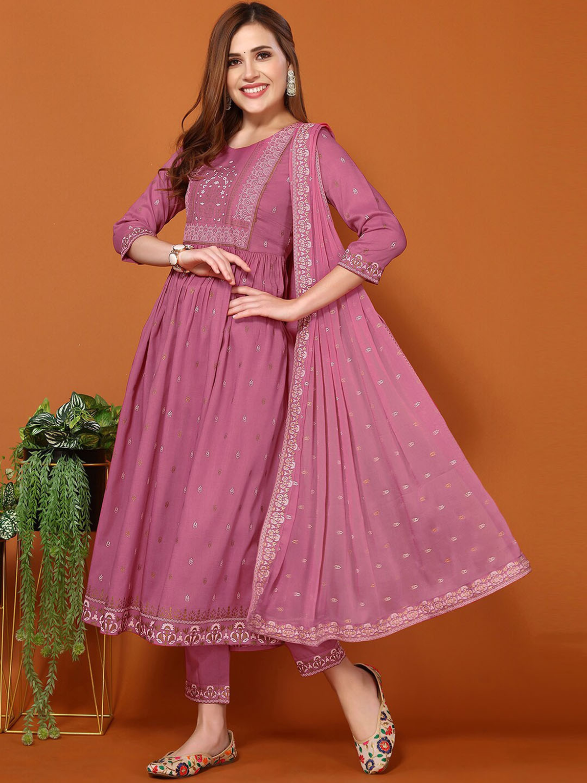 Aromie foil printed kurta set in pink with elegant embroidery and a coordinating dupatta for festive occasions