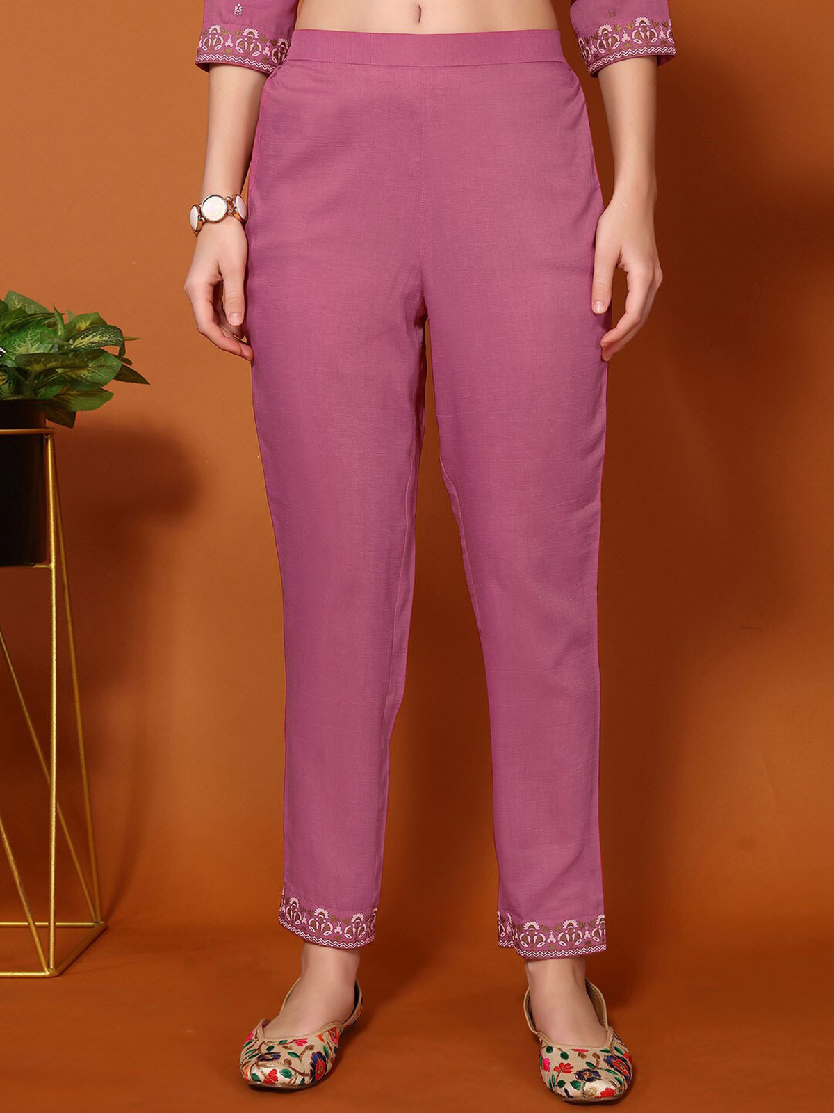 Elegant purple pants with embroidered hems from the foil printed kurta set by Aromie