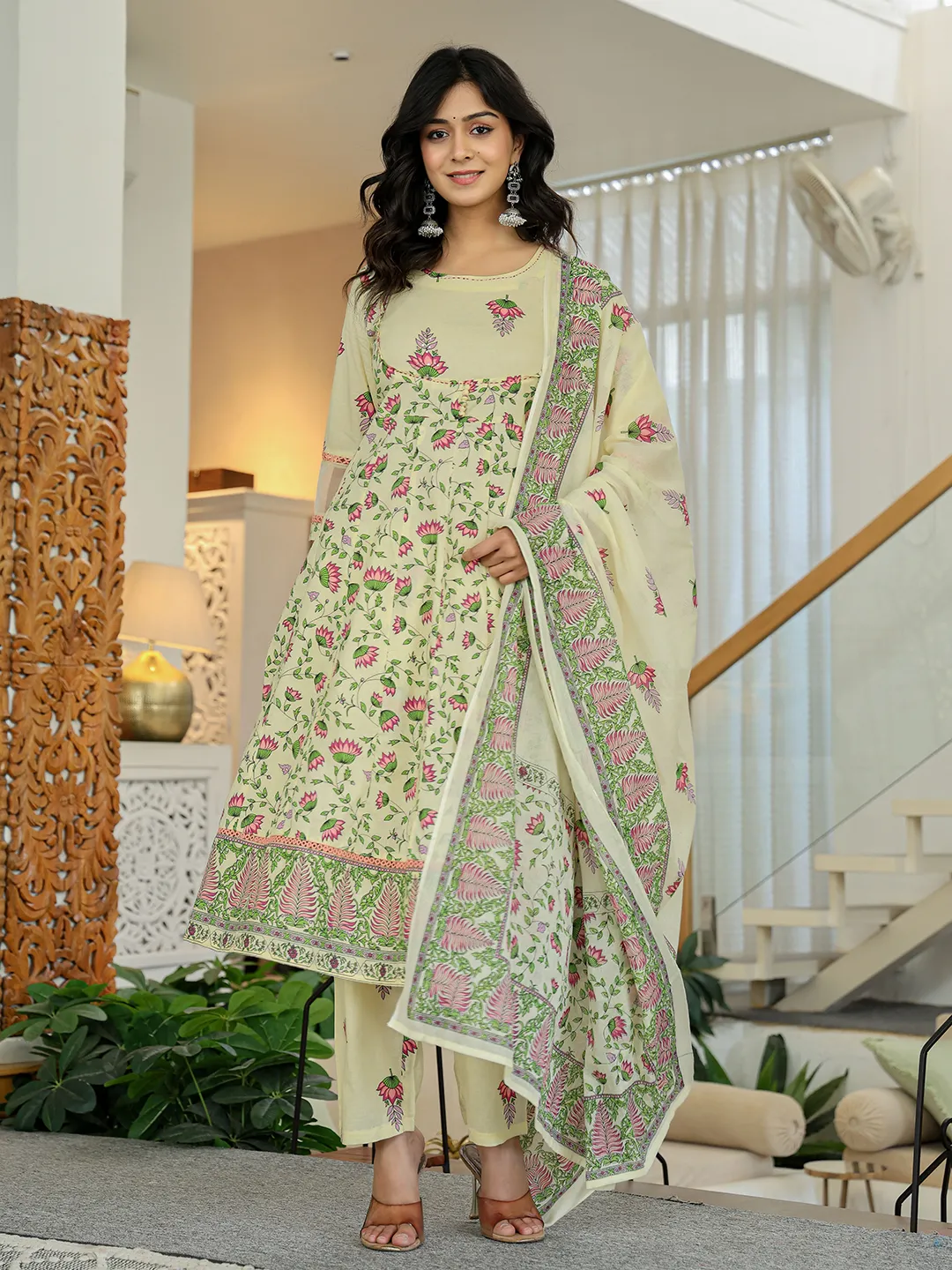 Three piece Georgette Anarkali Gown in light green with floral print, ideal for weddings and formal events.