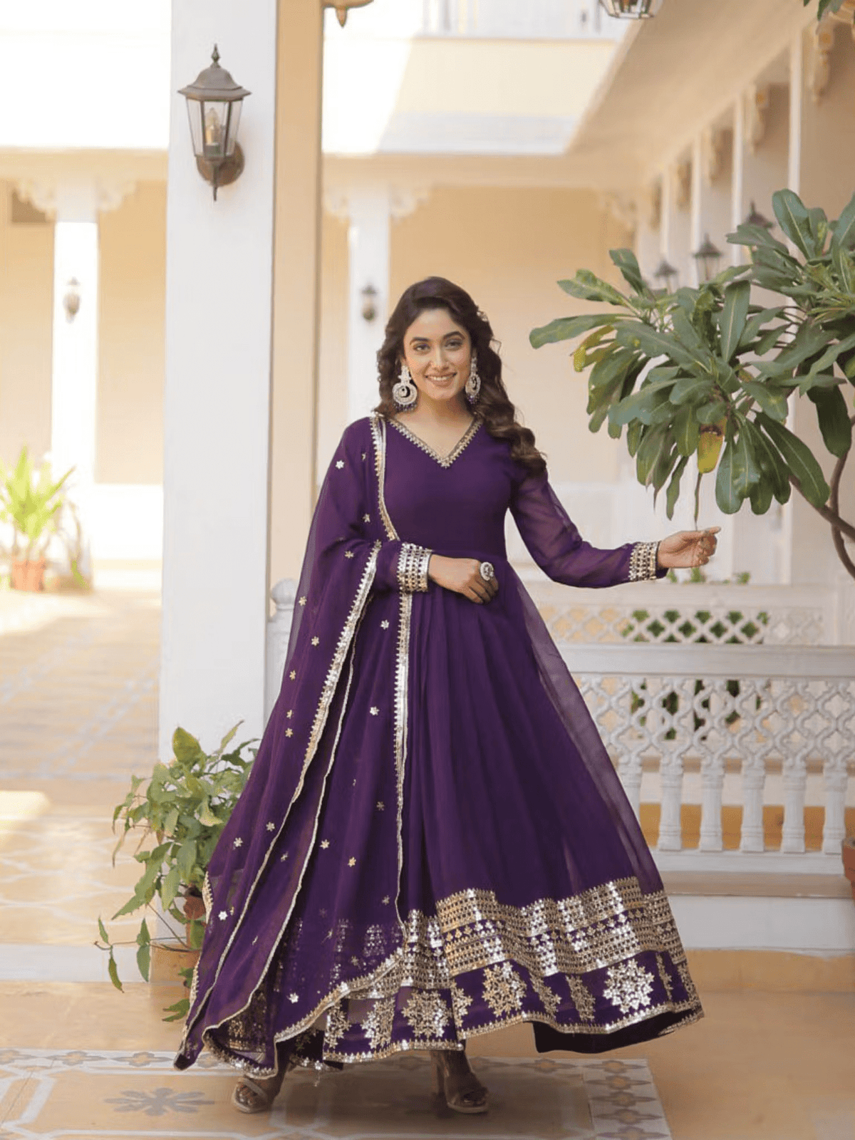 Elegant Georgette Embroidered Festive Gown in Purple with Detailed Golden Embroidery for Special Occasions