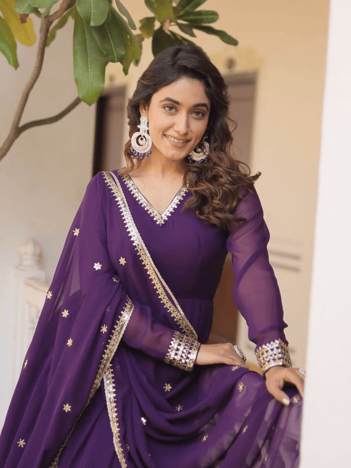 Aromie Georgette Embroidered Festive Gown in Purple with Elegant Star Patterns and Stylish Accessories
