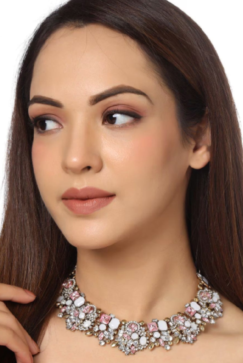 Aromie gold-plated necklace Canada with intricate floral designs and stone embellishments