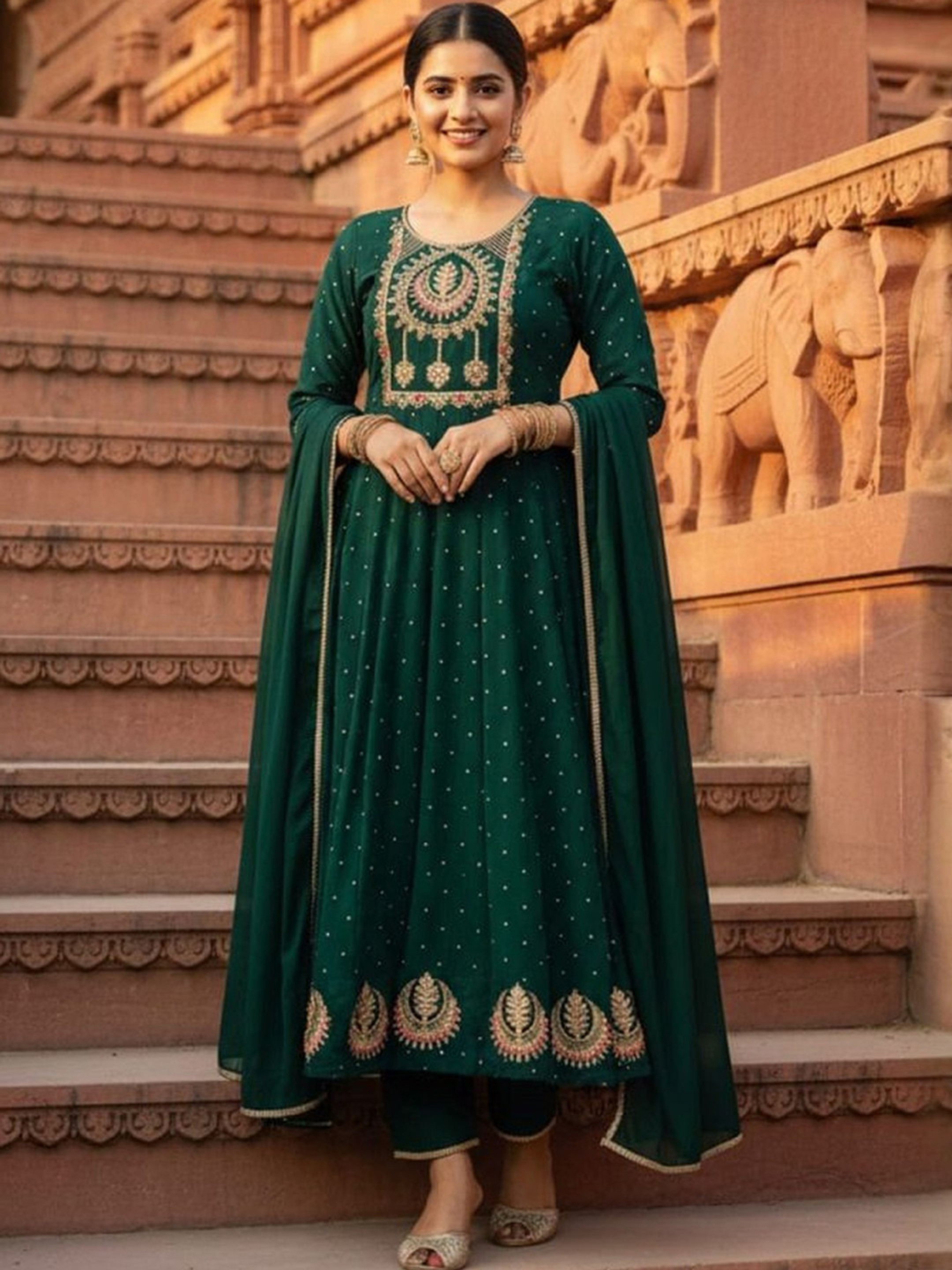 Green embroidered Anarkali suit Canada in front view, made of lightweight fabric, perfect for festive occasions.