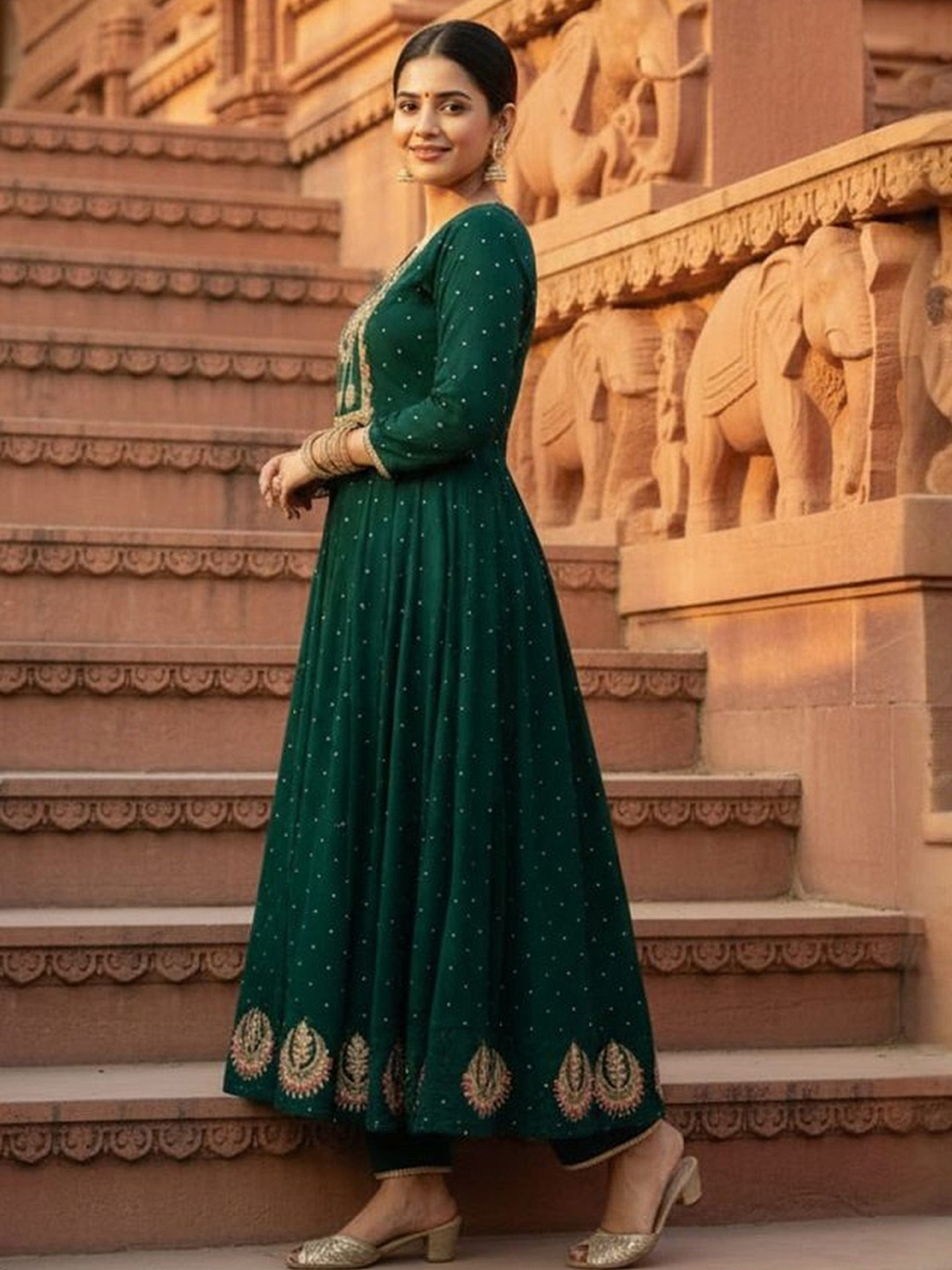 Side view of a green embroidered Anarkali suit Canada, made of soft fabric, perfect for festive occasions.