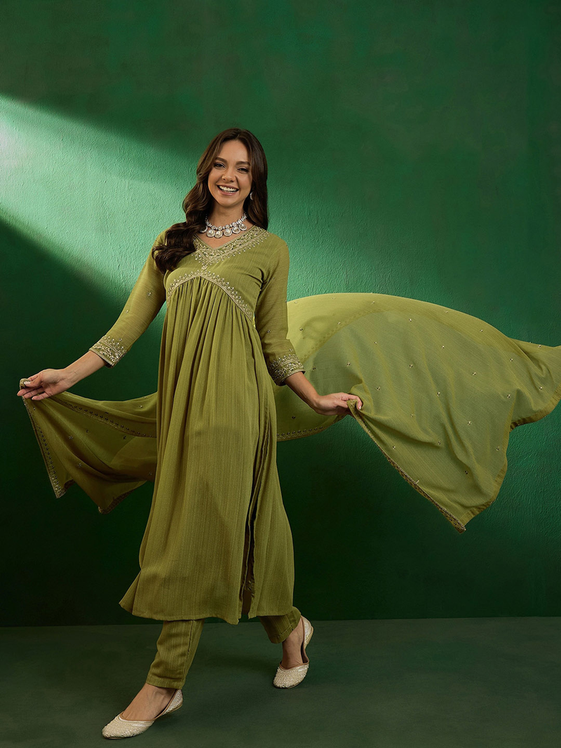 Green embroidered kurta set Canada with flowing fabric, perfect for festive occasions or casual wear
