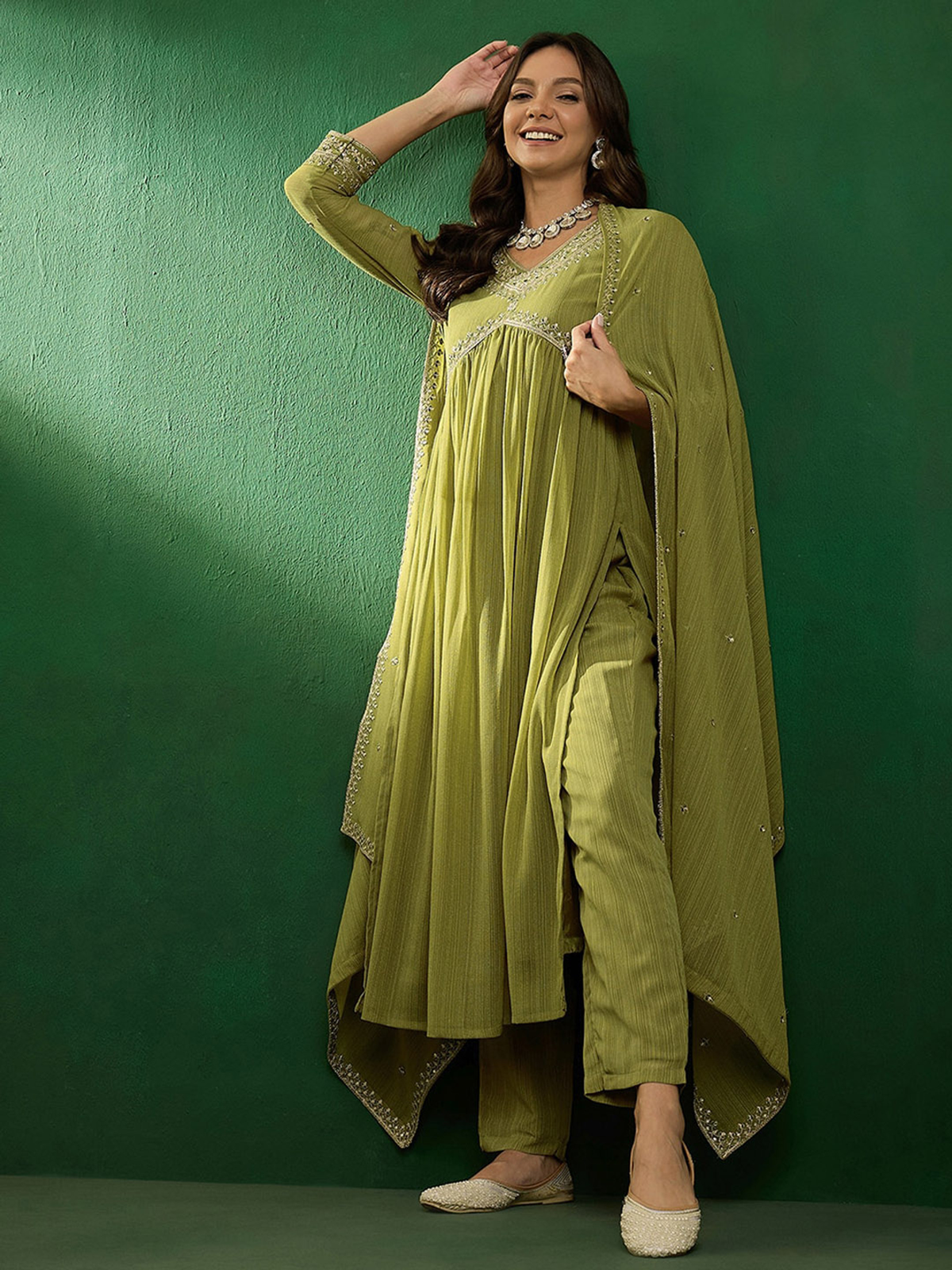 Three piece green embroidered kurta set Canada in a flowy fabric, perfect for festive occasions