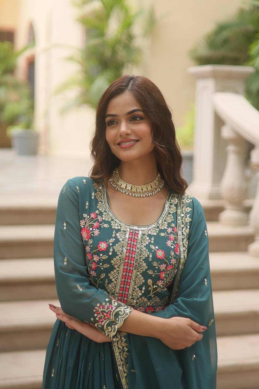 Green sharara suit set Canada with intricate floral embroidery, made of soft fabric, perfect for festive occasions.