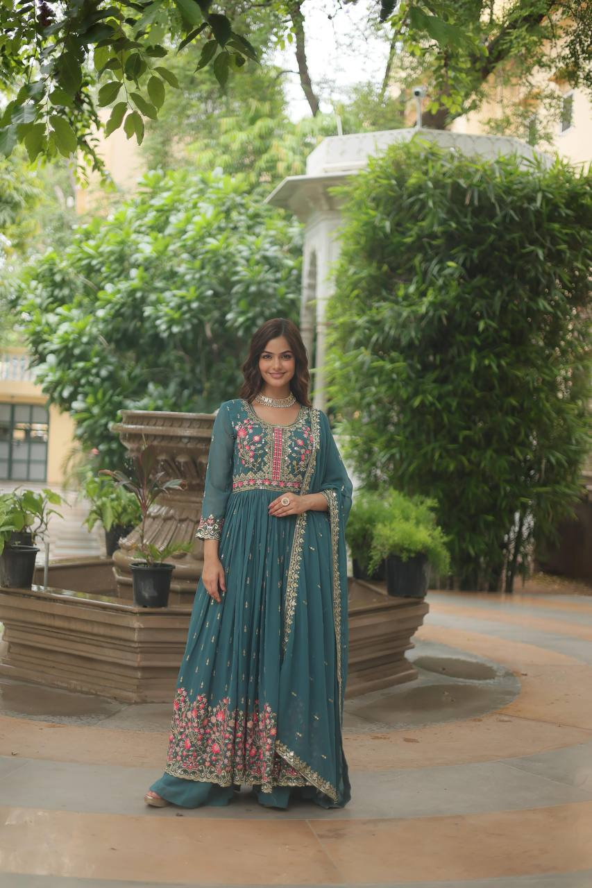 Elegant green sharara suit set Canada featuring floral embroidery in a front view, ideal for festive occasions.