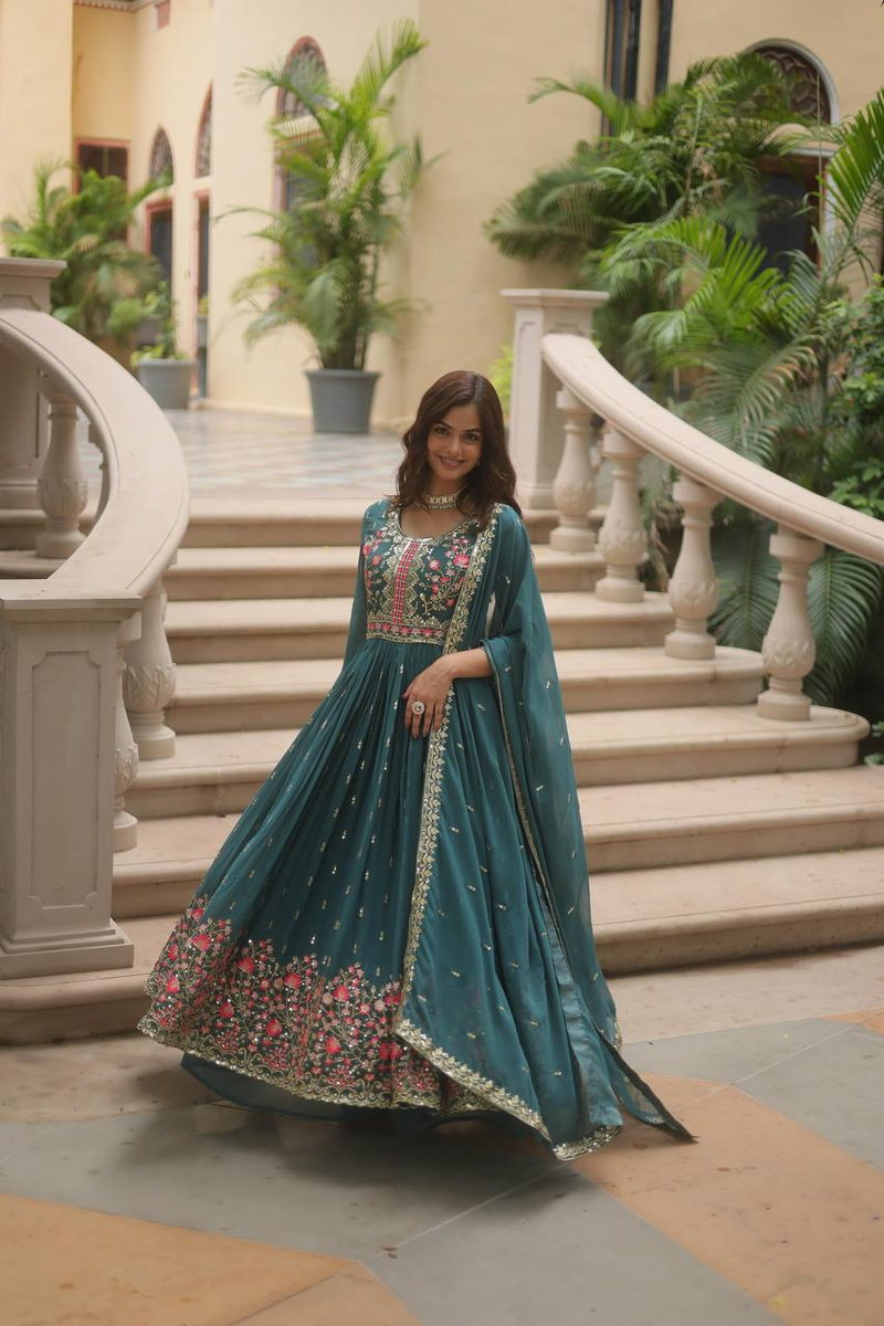 Elegant green sharara suit set Canada in soft fabric with detailed floral embroidery, perfect for festive occasions.