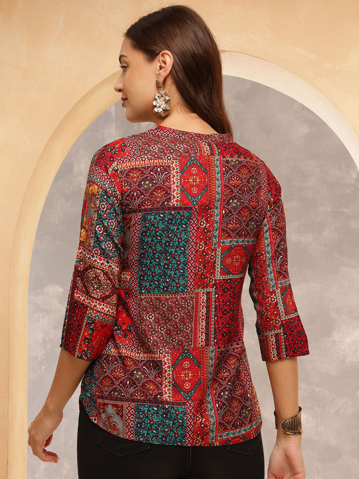 Aromie single piece kurta featuring a colorful hand block printed jumpsuit design with three-quarter sleeves