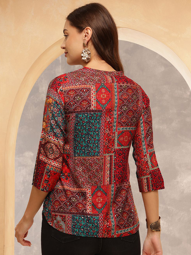 Aromie single piece kurta featuring a colorful hand block printed jumpsuit design with three-quarter sleeves