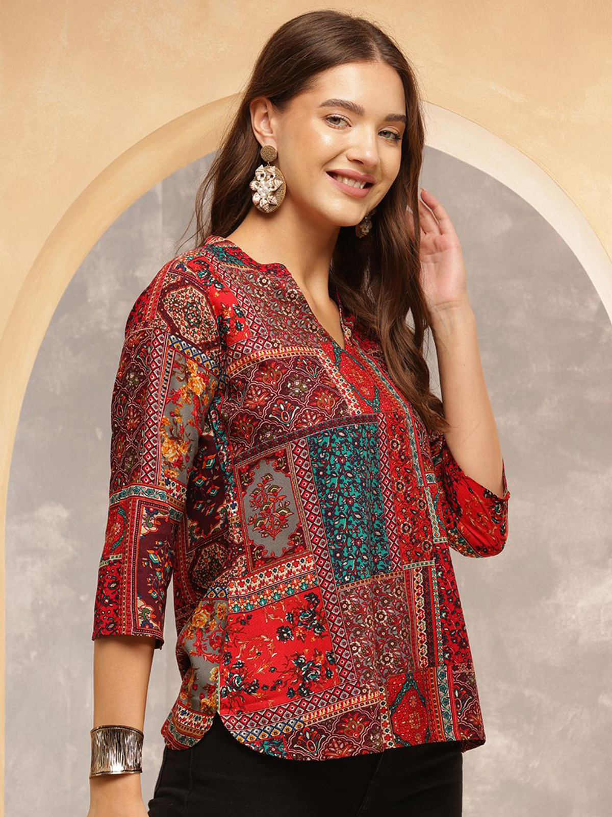 Aromie single piece kurta featuring a vibrant hand block printed jumpsuit pattern with three-quarter sleeves
