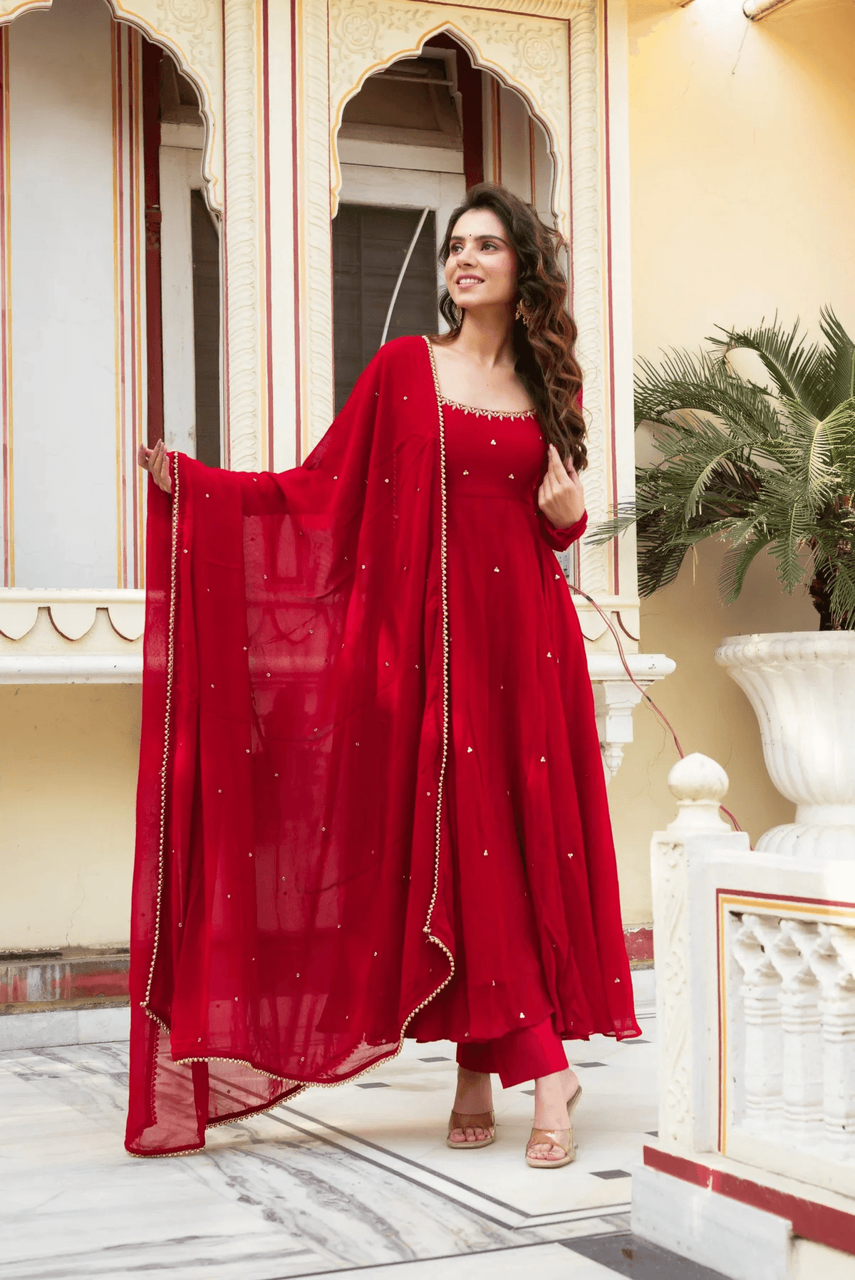Aromie red three piece Kurtha with hand work Anarkali suit Canada, featuring elegant detailing and flowing design.
