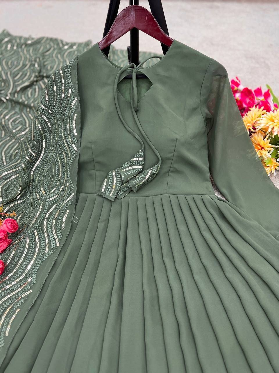 Front view of a green three piece Kurtha set in heavy faux georgette, ideal for weddings or special events