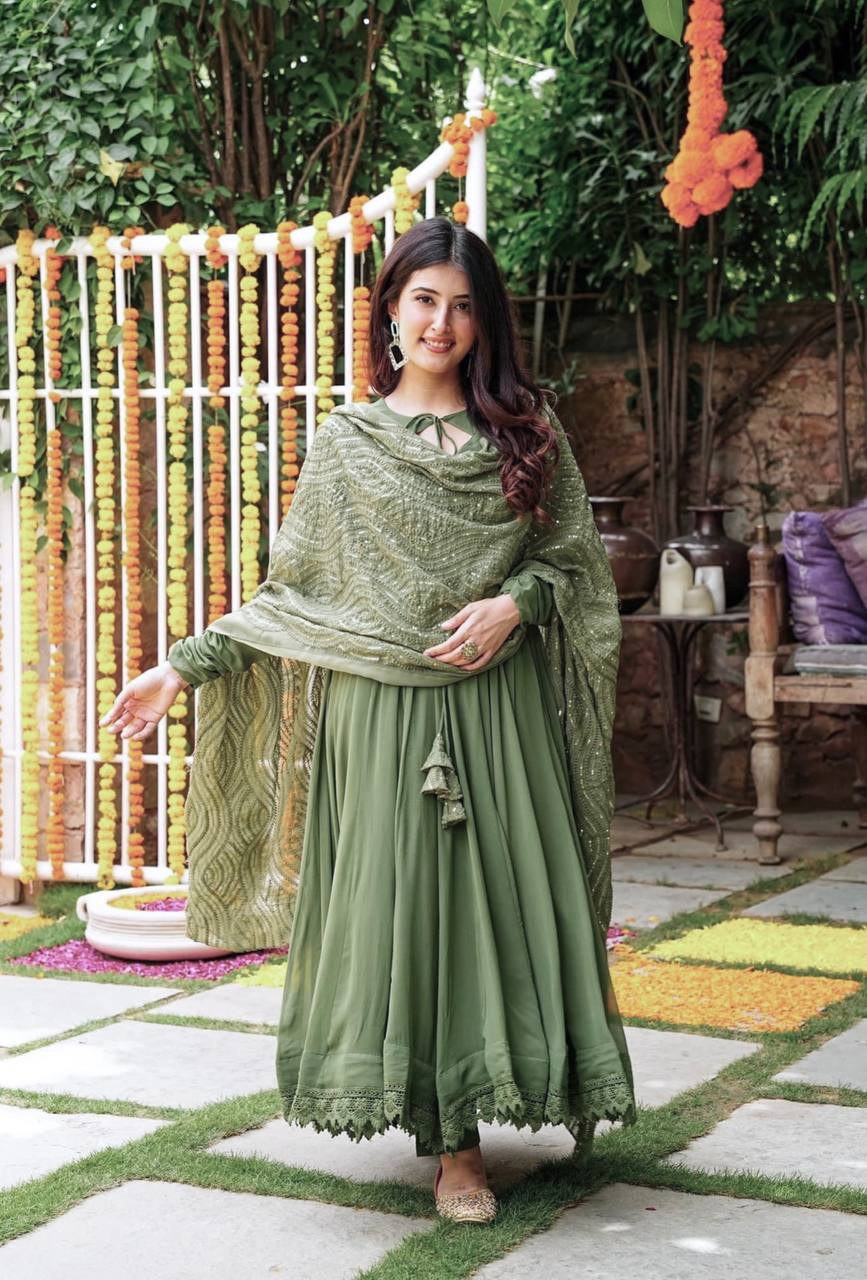 Three piece Kurtha set in olive green heavy faux georgette gown set, perfect for festive occasions, featuring a detailed front view.
