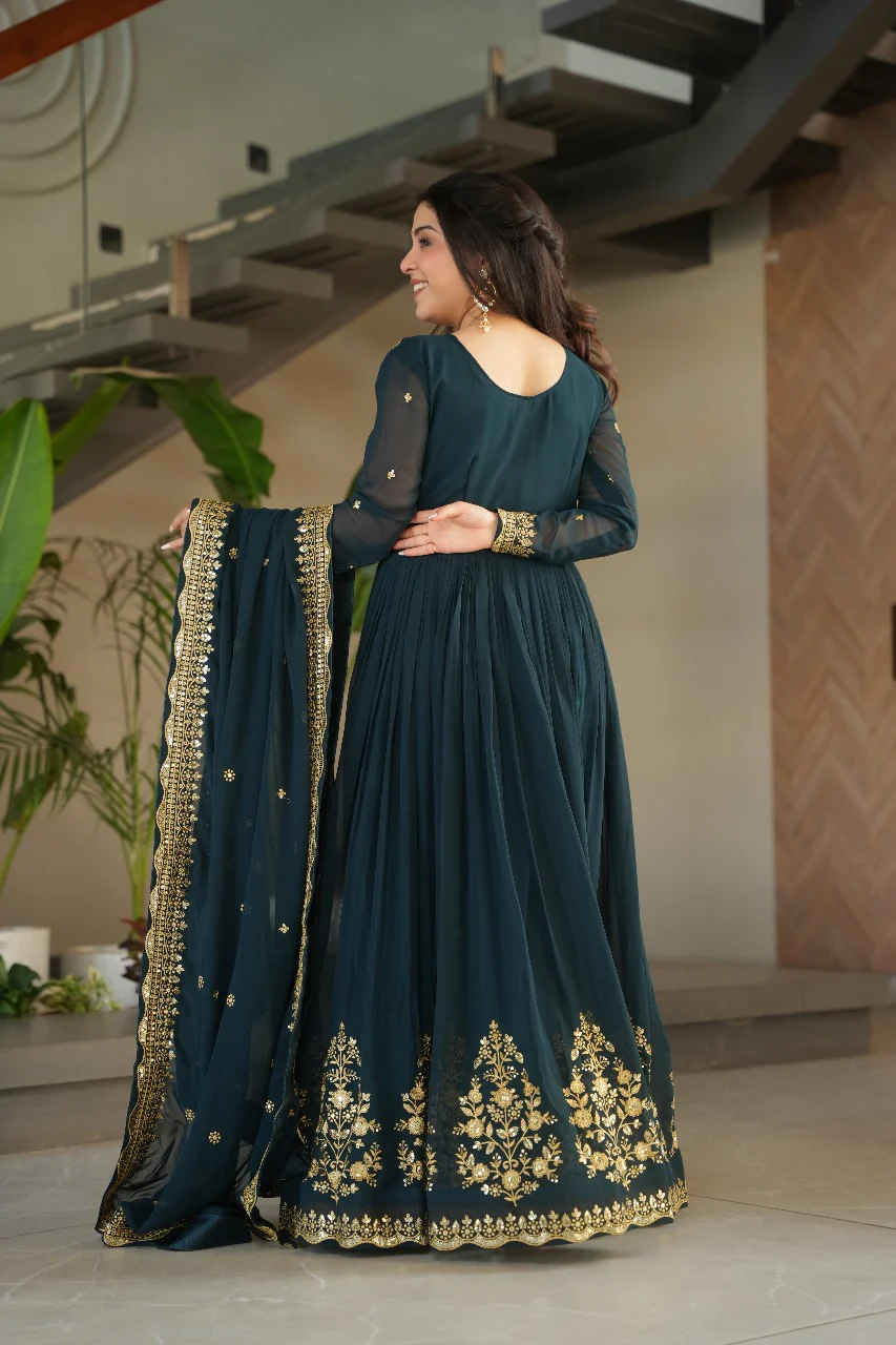Heavy wine faux georgette gown with dupatta, featuring elegant gold embroidery, perfect for wedding celebrations