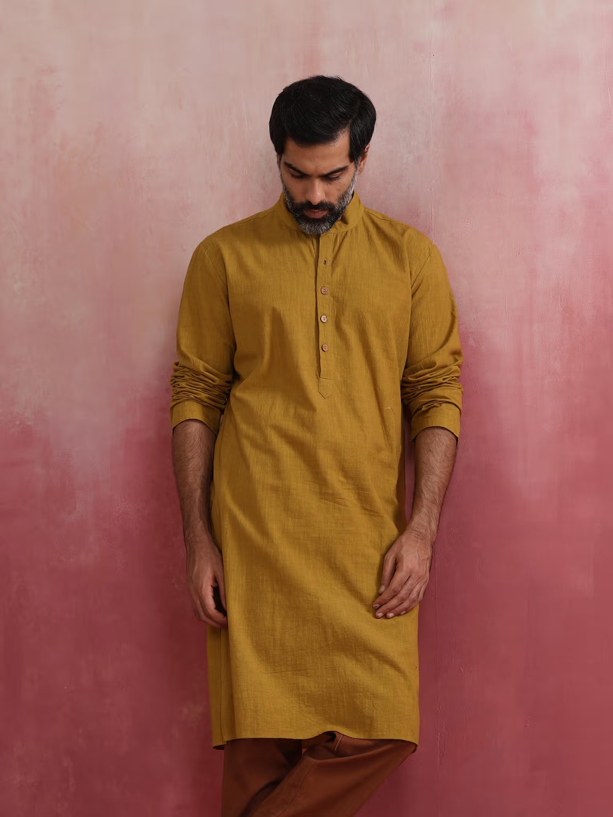 AROMIE men's mustard kurta Canada long sleeve cotton kurta with band collar and front placket worn by model