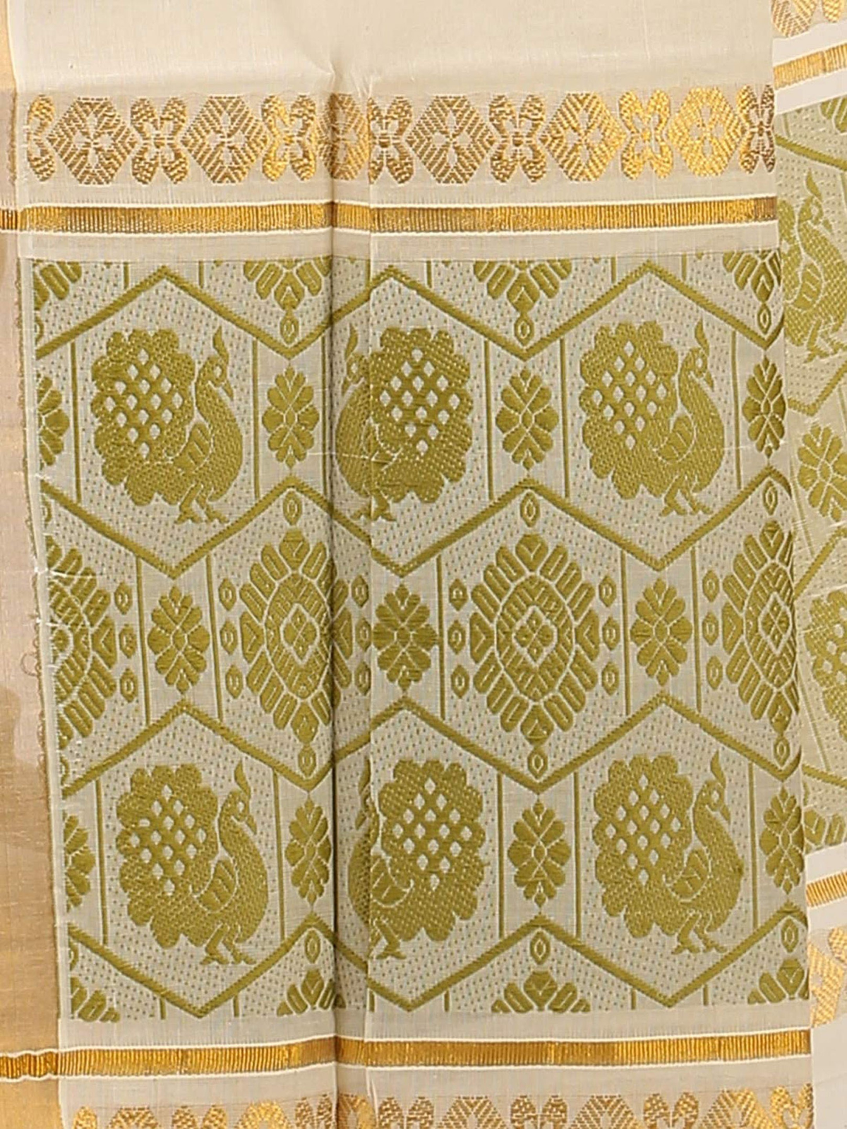 Aromie Ikat saree with zari border featuring intricate gold peacock and floral patterns on beige fabric
