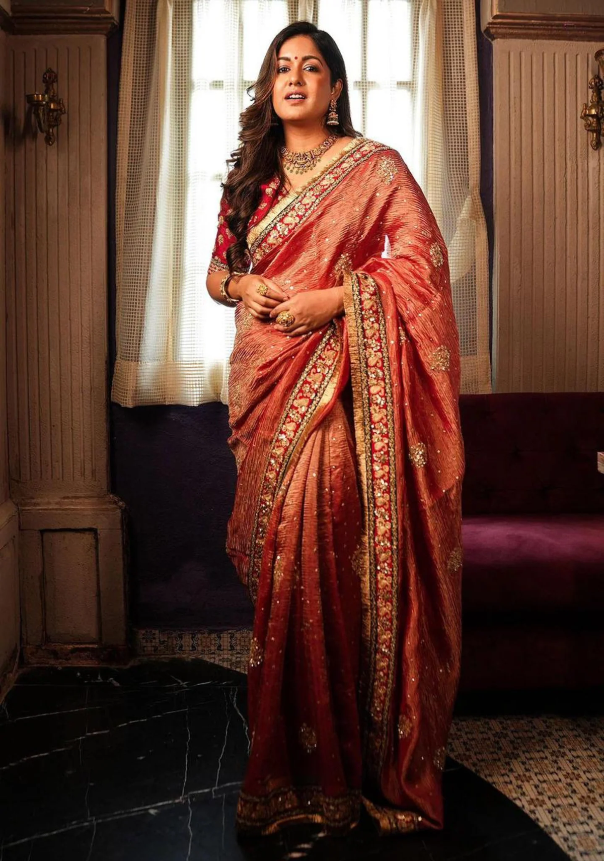 Elegant orange Indian chiffon saree with intricate detailing, perfect for festive occasions in Canada