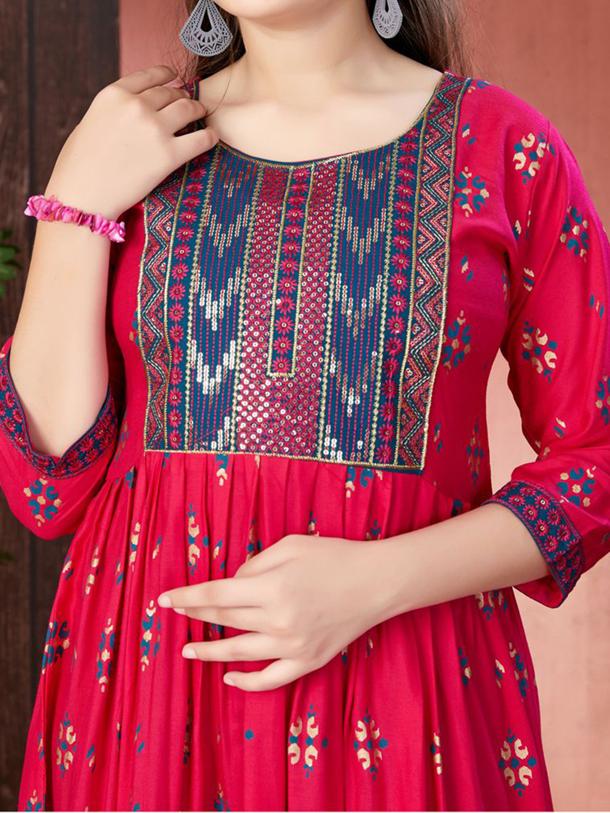 Aromie Indian Girls Dress USA in vibrant pink with detailed embroidery, perfect for festive occasions