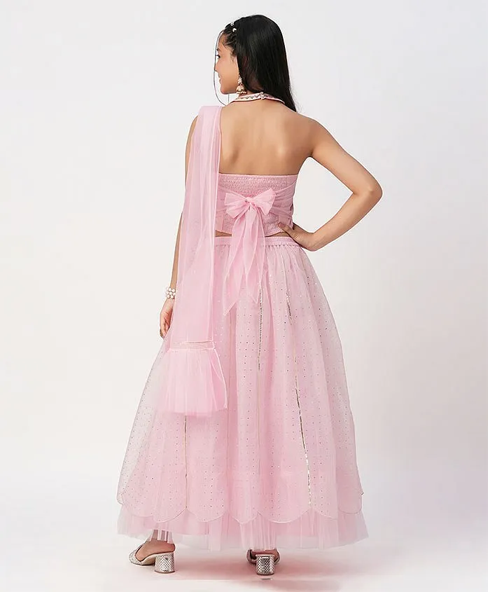 Back view of a pink Indian Kids Dress USA with tulle skirt and elegant bow detail for special occasions