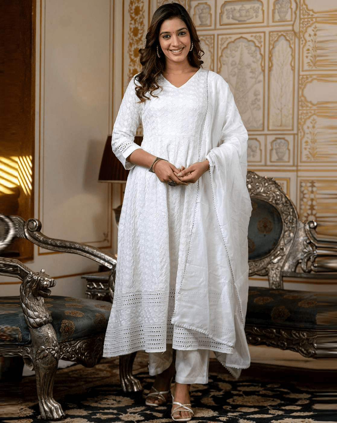 Elegant white Indian kurta set with dupatta, featuring intricate details and stylish design for festive occasions
