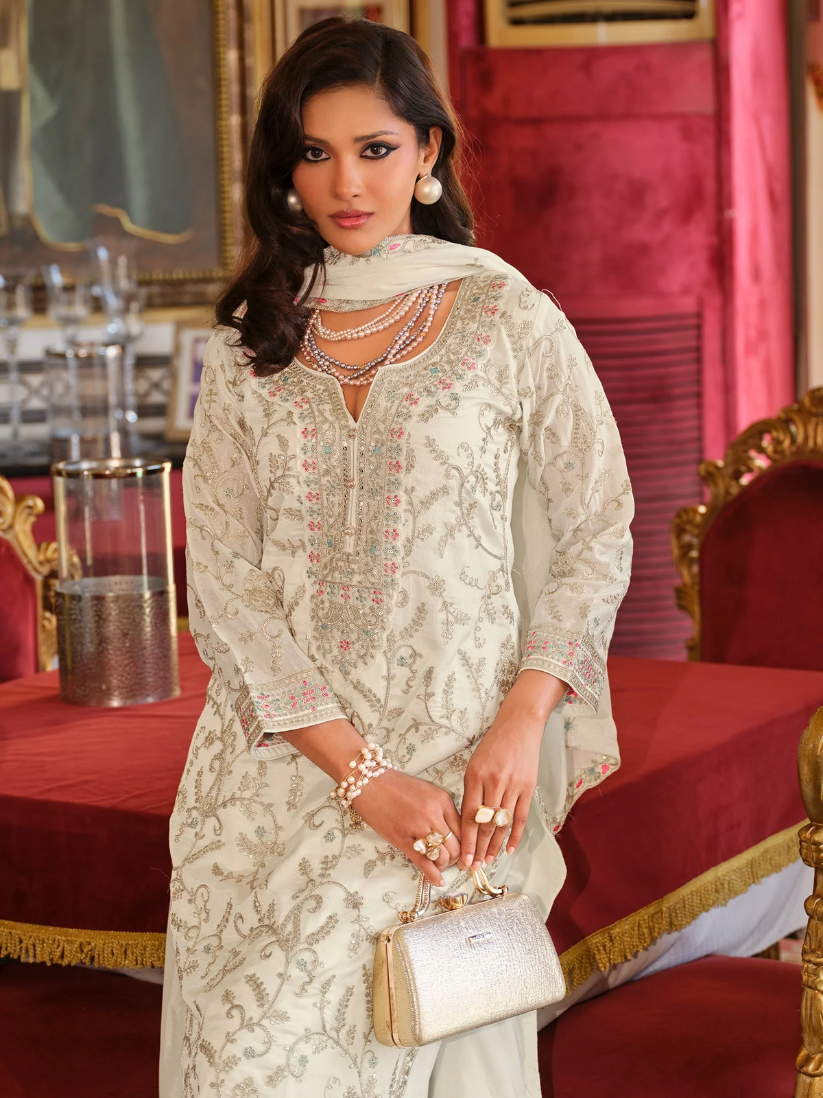 Elegant cream three piece Kurta set with intricate embroidery, perfect for festive occasions, featuring a front view.