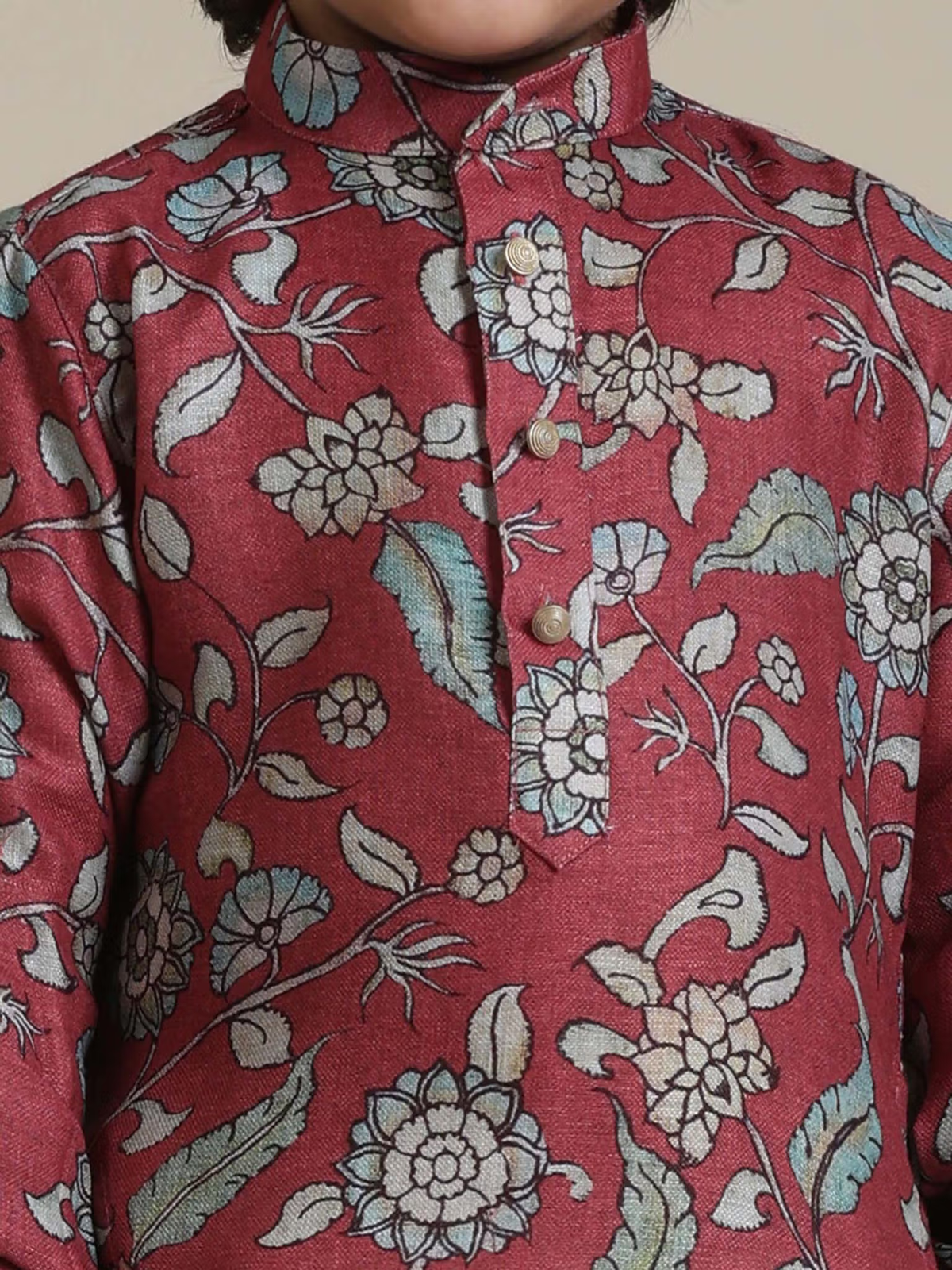 AROMIE boys mandarin collar kids rust floral kurta pyjama set close up showing blue cream floral print and wooden buttons