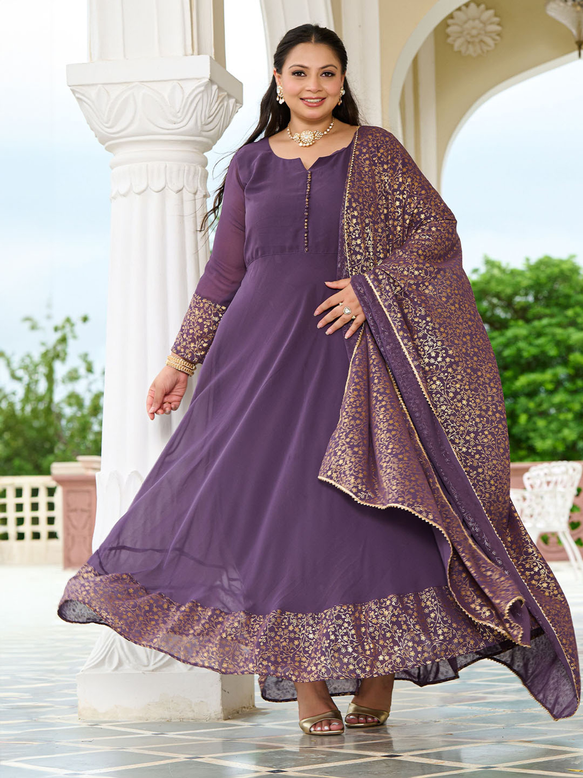 Elegant lavender anarkali kurta with dupatta featuring intricate embroidery and a flowing design