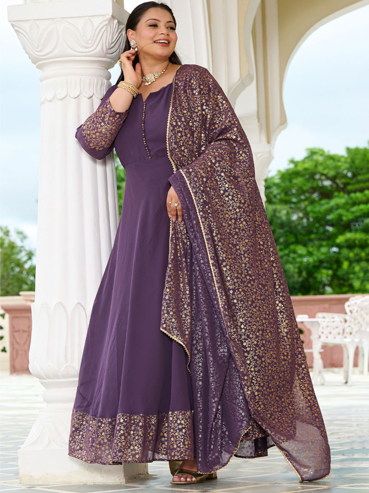 Lavender anarkali kurta with dupatta featuring elegant embroidery and a flowing design