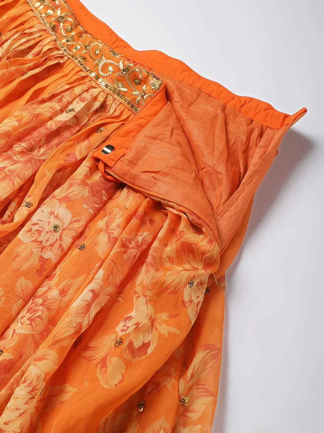 Front view of an orange floral lehenga choli set Canada with detailed embroidery, perfect for festive occasions